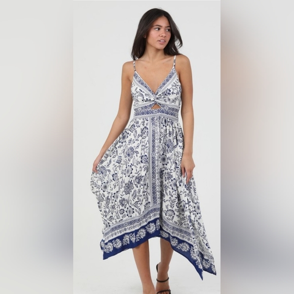 Angie Dresses & Skirts - V neck twist front cutout detail handkerchief style hem dress